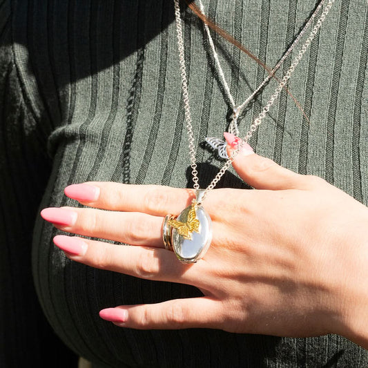 Four Photo Oval Butterfly Locket Silver & Gold + Photos