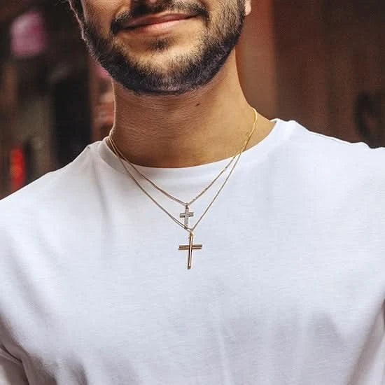man wearing gold cross necklace, sturdy gold curb chain, high polish finish, rounded edges, solid gold pendant for men and women, diamond cross necklace, double cross necklace, two chains