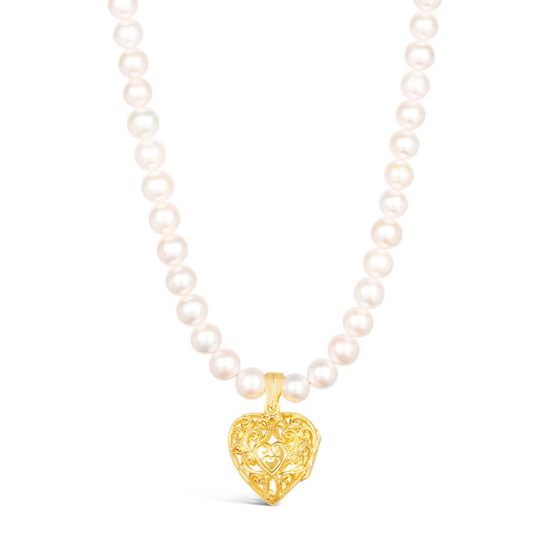 white pearl necklace with gold filigree heart locket