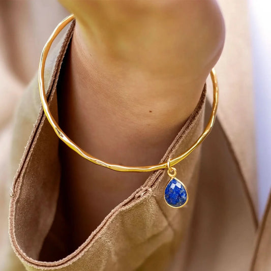 model wearing lapis lazuli bangle gold