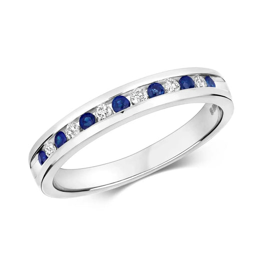 sapphire and diamond solid white gold band ring on white background