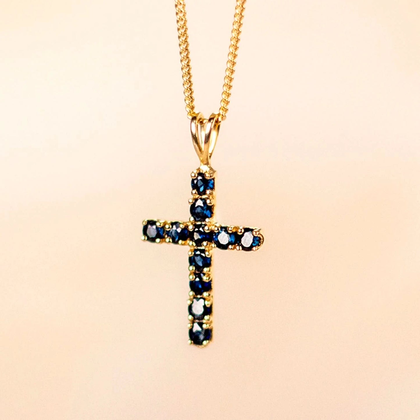 Sapphire Cross Necklace in Solid Gold