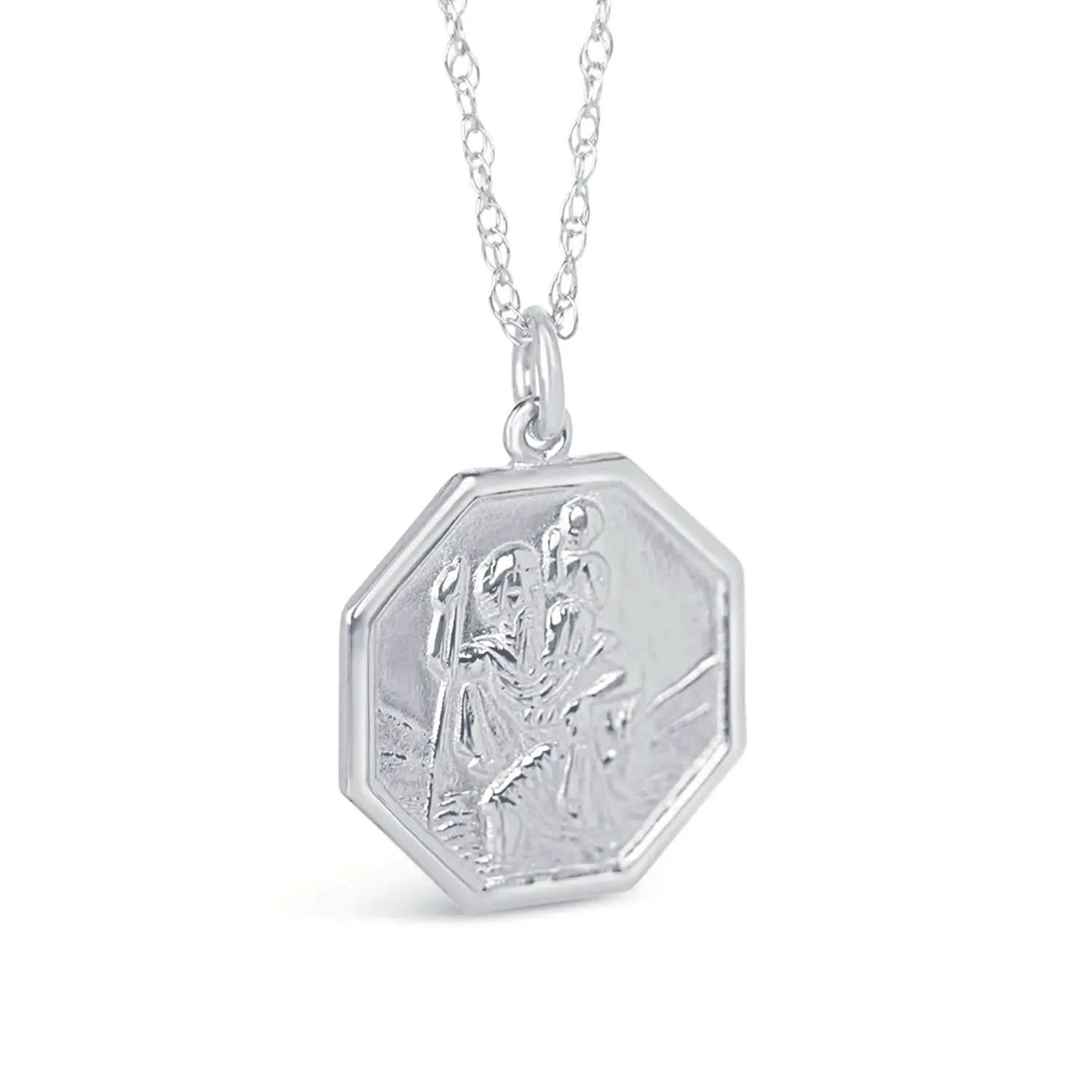 Side of view of a Men's large St Christopher necklace in white gold with an engraved pendant, displayed on a chain on a white background