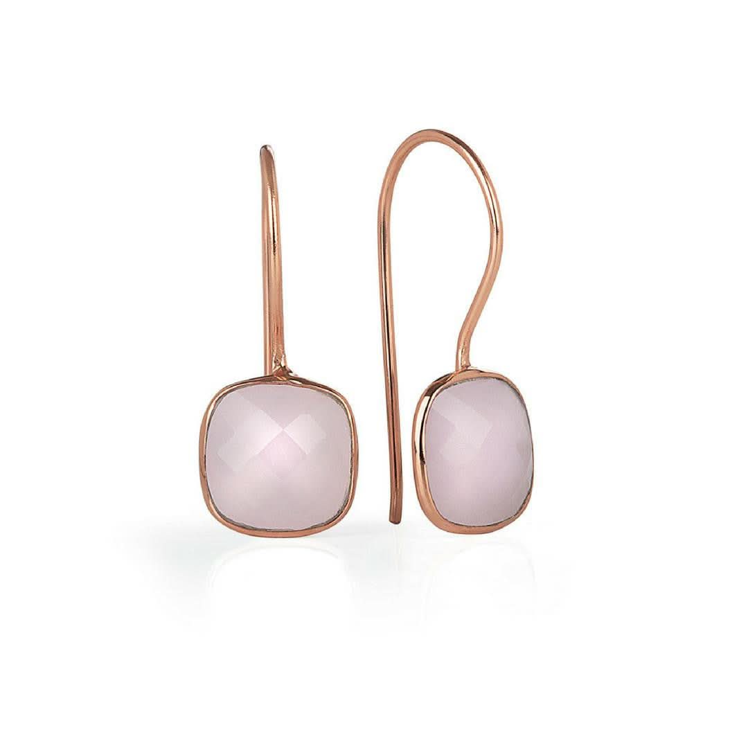 rose quartz earrings in rose gold on a white background