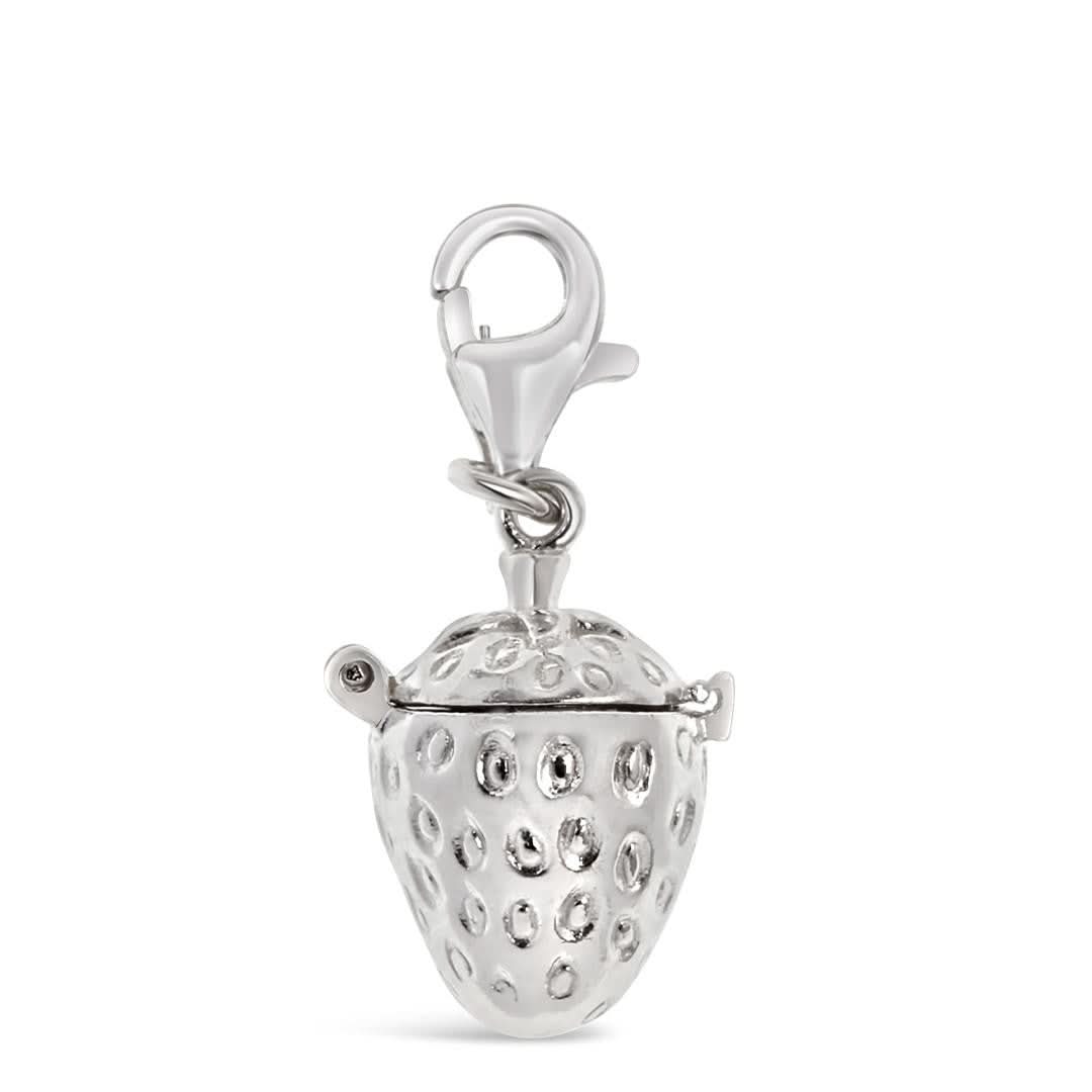 magical silver strawberry charm on a white background