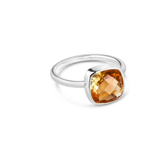 citrine cocktail ring in silver on a white background