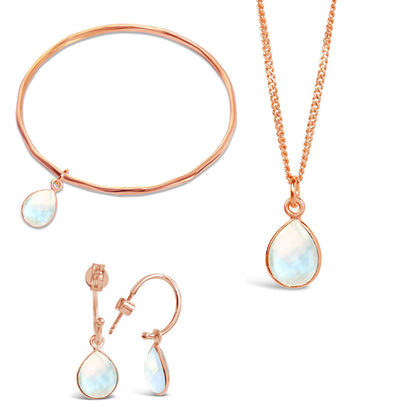 white quartz rose gold charm bangle, necklace and drop hoop earrings