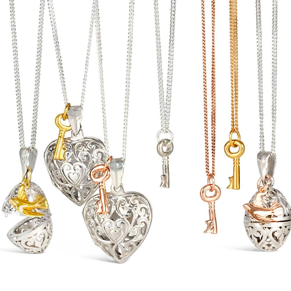 collection of jewellery with bird or key charm attached