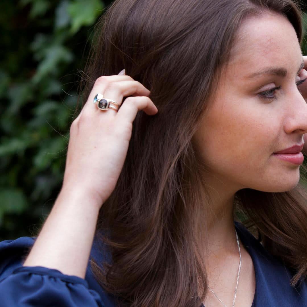 model wearing rutilated quartz cocktail ring in gold
