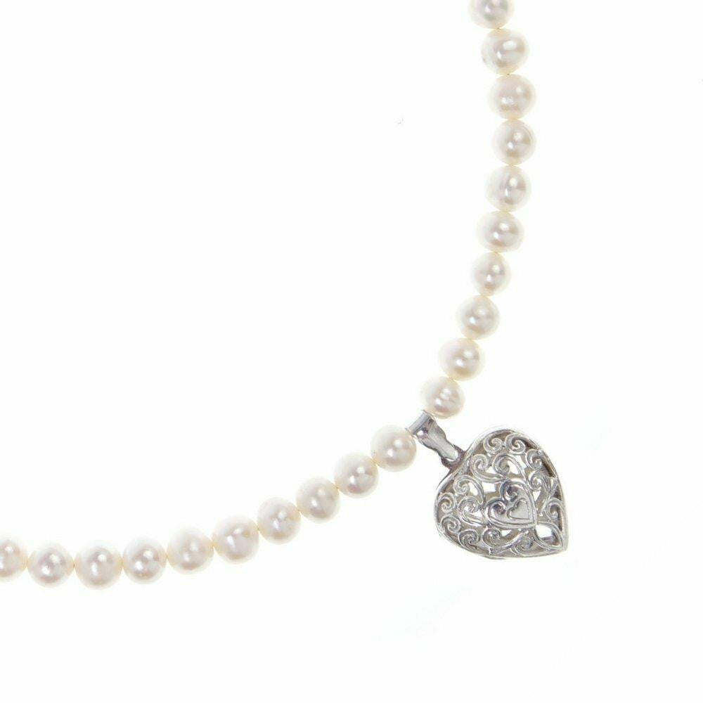 keepsake heart necklace in ivory on a white background