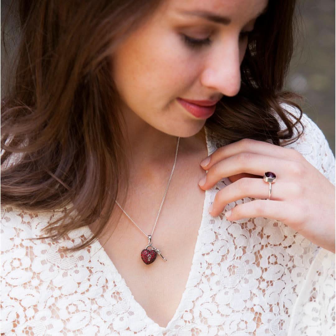 model wearing key to my heart pendant in red
