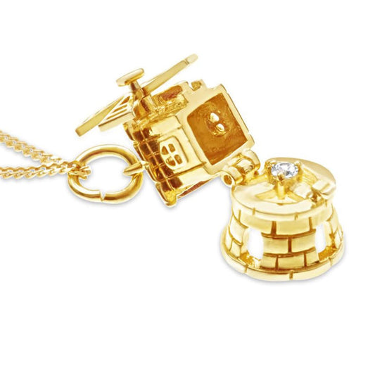 inside magical gold windmill charm