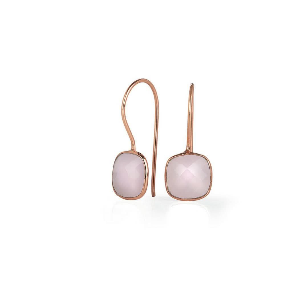 rose quartz cocktail ring in rose gold on a white background