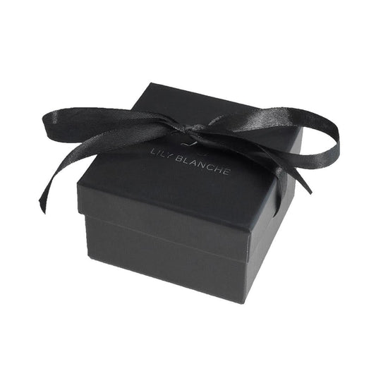 Black ribbon-tied Lily Blanche gift box on a white background