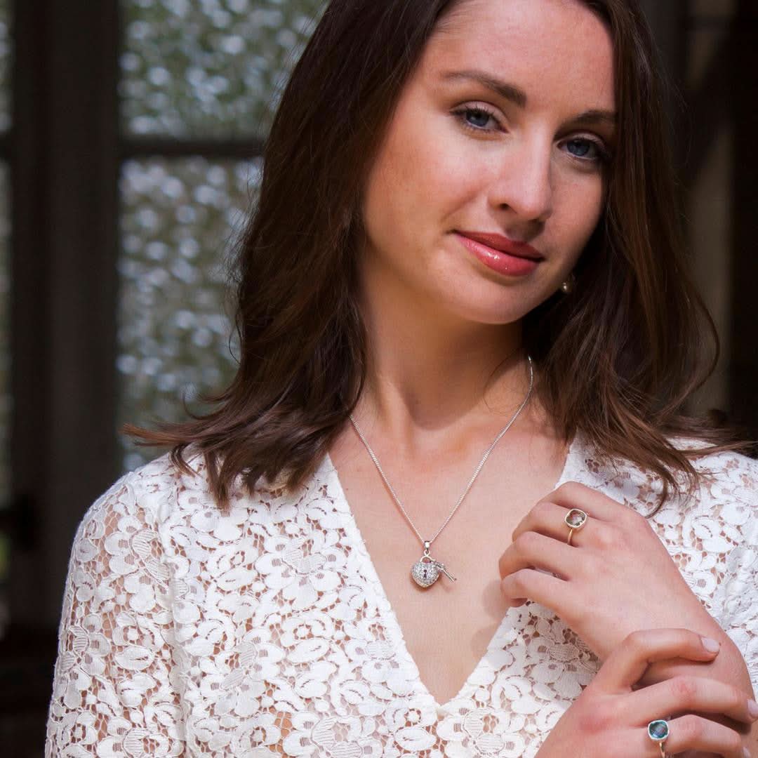 model wearing key to my heart pendant in white