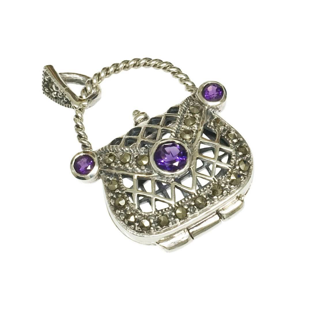 amethyst handbag locket in silver on a white background