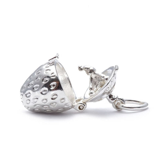 opened magical strawberry charm on a white background