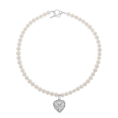 keepsake heart necklace on a white background