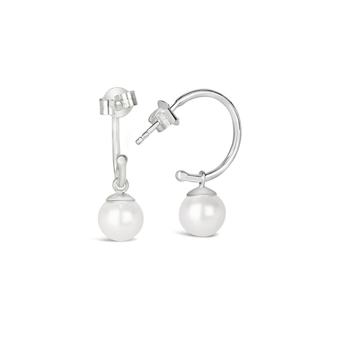 round pearl drop hoop earrings in ivory silver on a white background