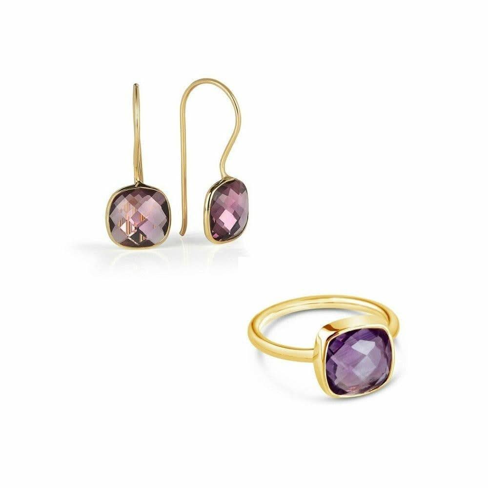 purple amethyst earrings in gold with matching ring on a white background