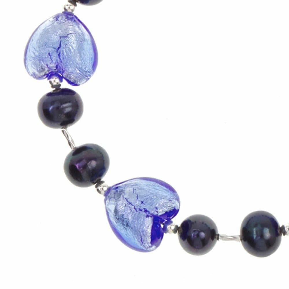 close up of midnight pearl heart bracelet on a white background