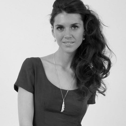 model wearing little pod earrings