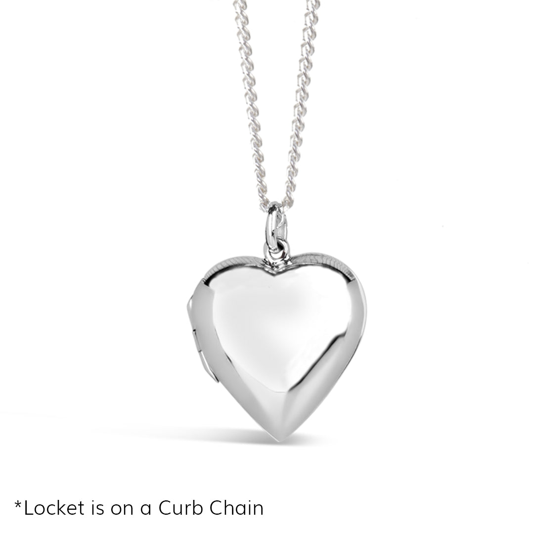 large two photo heart locket in silver on a white background