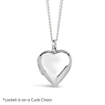 large two photo heart locket in silver on a white background