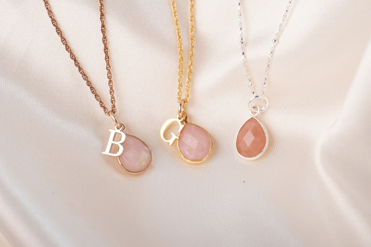 silver, rose gold and gold pink opal necklaces 