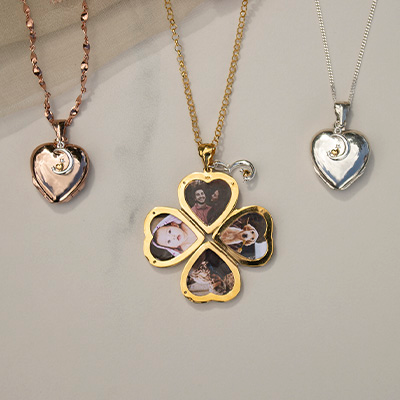 3 heart shaped lockets lying open on a surface