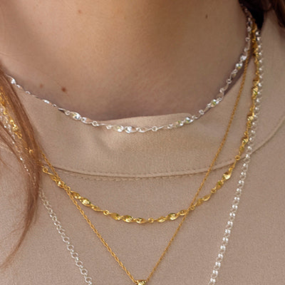 Model wearing Lily Blanche Twist chains 