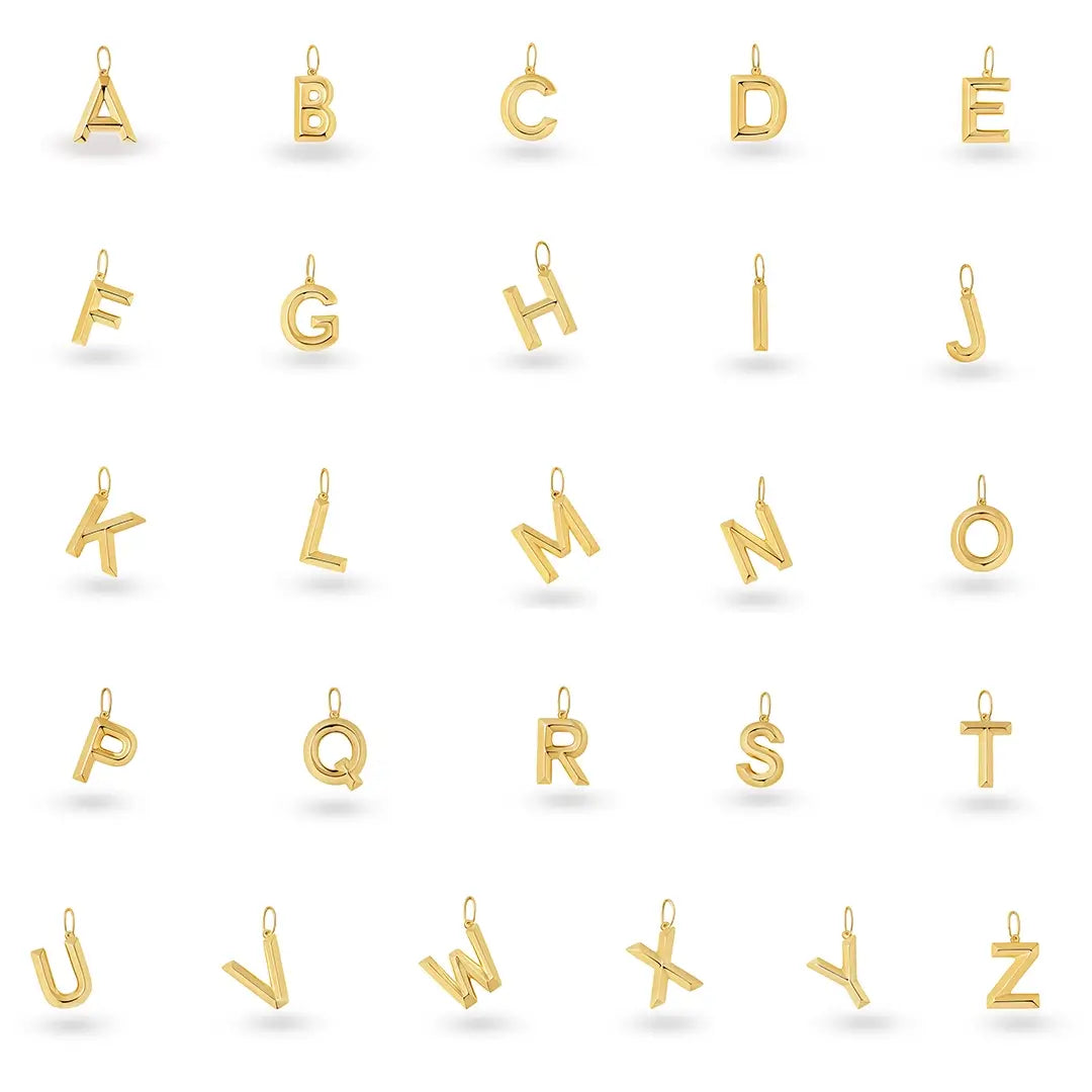 Collection of polished solid 9ct gold alphabet letter charms from A to Z, displayed individually on a white background. Each three-dimensional initial pendant features a modern block font with a polished finish and a small loop for attaching to a necklace or bracelet.
