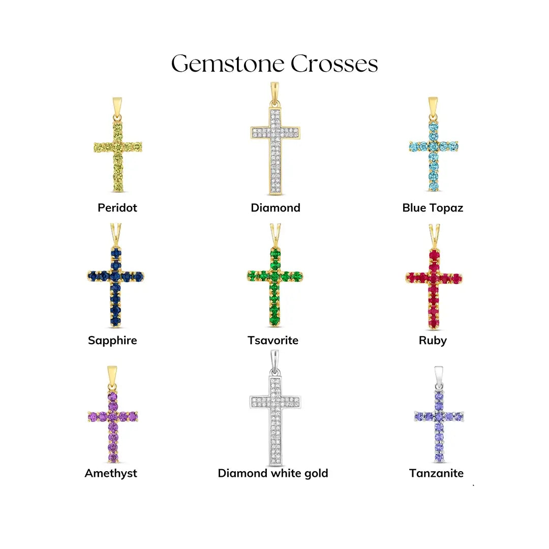 Collection of gemstone cross pendants showing peridot, diamond, blue topaz, sapphire, tsavorite, ruby, amethyst, diamond in white gold, and tanzanite options arranged on a white background with labels