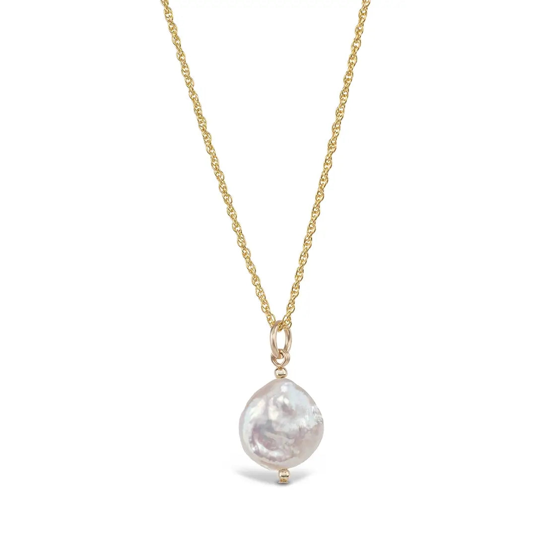 Gold rope chain necklace with coin pearl pendant on white background, minimalist freshwater pearl design