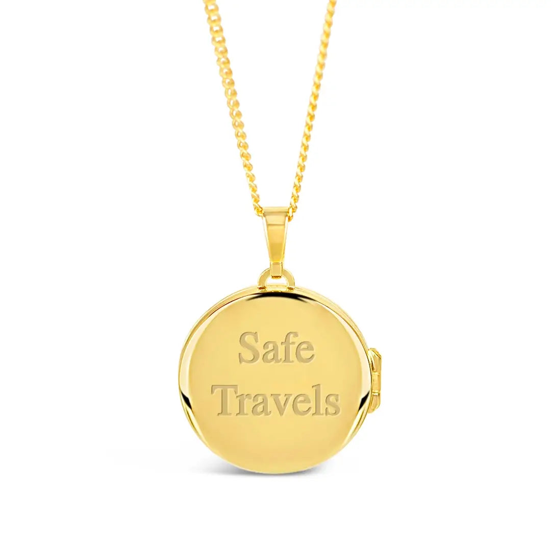 Gold St Christopher locket with engraved message “Safe Travels” on the polished back