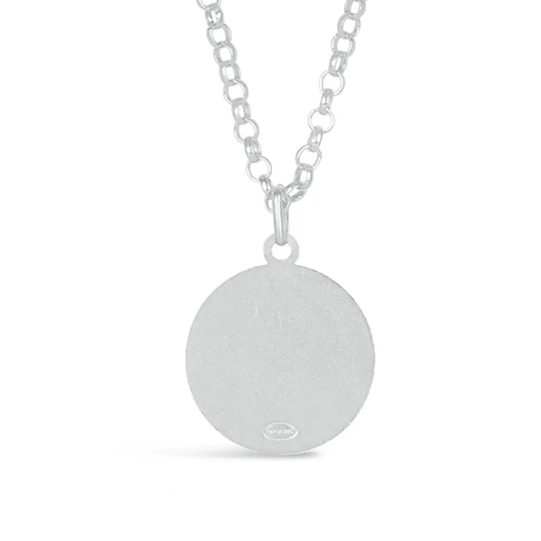 Back view of a round sterling silver coin pendant necklace on a belcher chain, showing a smooth polished surface