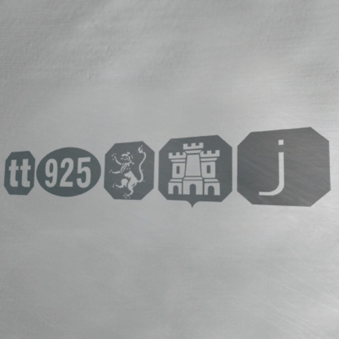 Close-up of Lily Blanche's official sterling silver hallmark, including the 925 mark, Edinburgh Assay Office hallmark and maker's mark