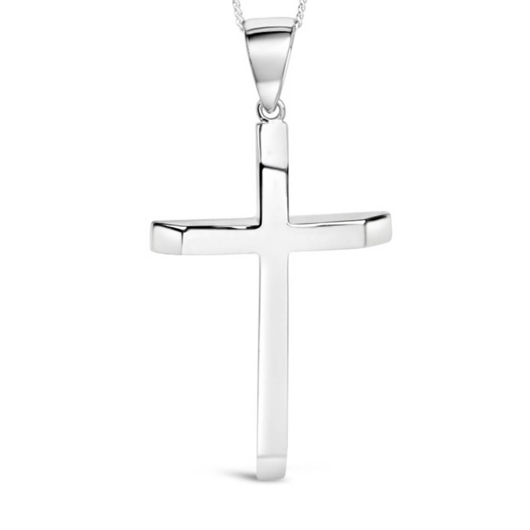 XL sterling Silver cross pendant on a white background close up