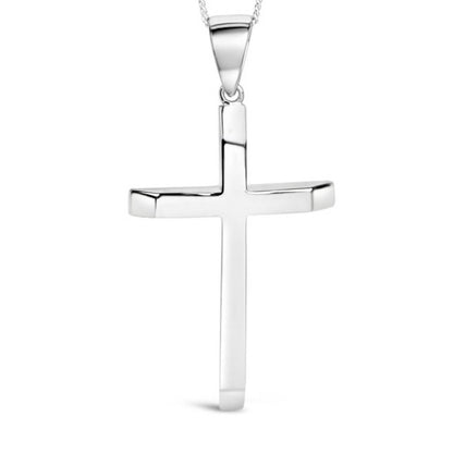 XL sterling Silver cross pendant on a white background close up