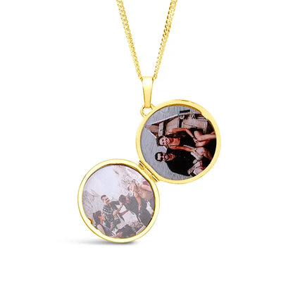 Gold round locket necklace open to display two personal photos inside, polished gold vermeil finish