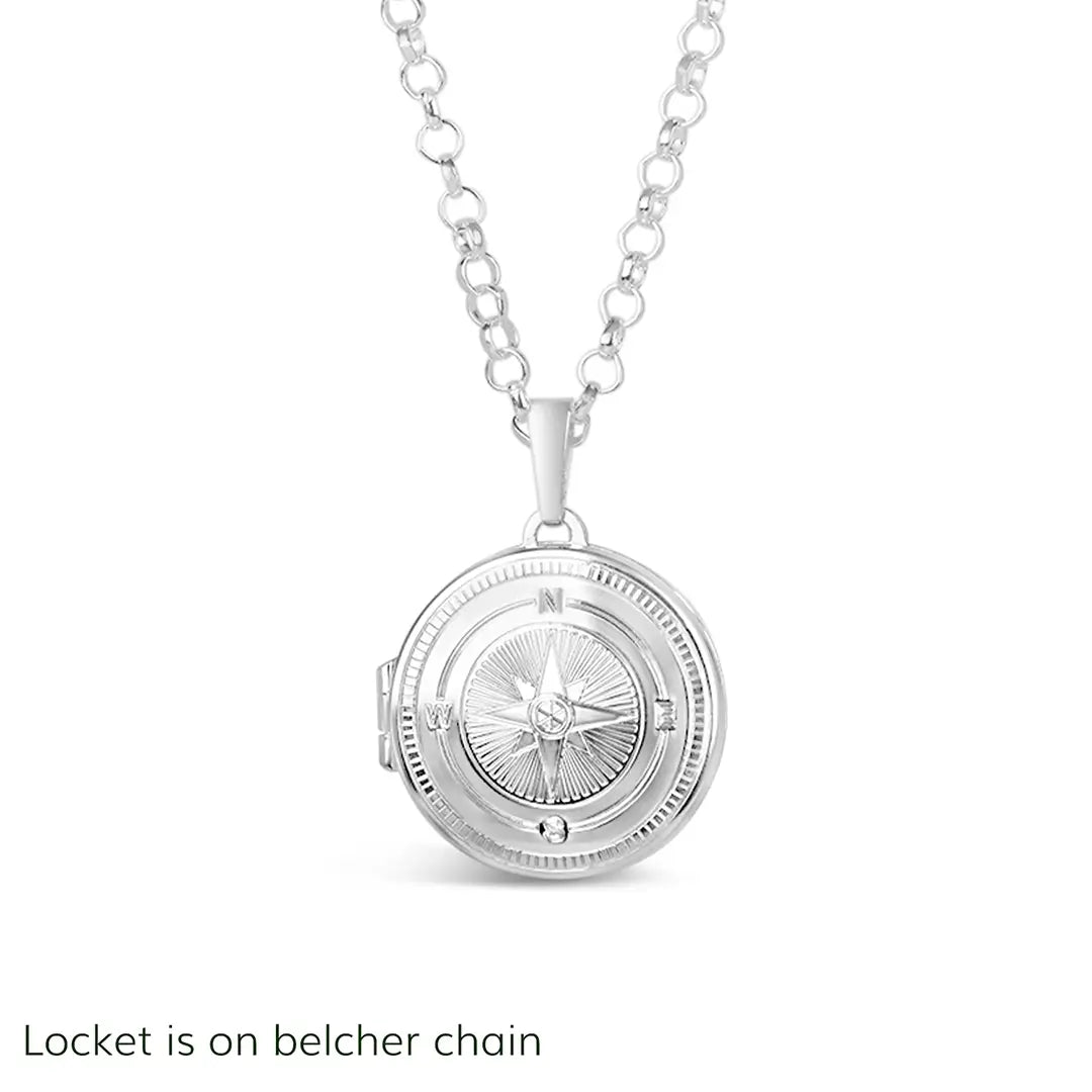 Front-facing product image of a silver compass locket necklace on a white background