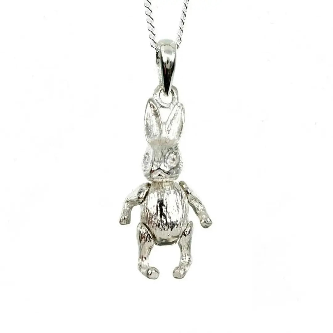 Sterling silver rabbit charm pendant isolated on white background, detailed bunny jewellery design
