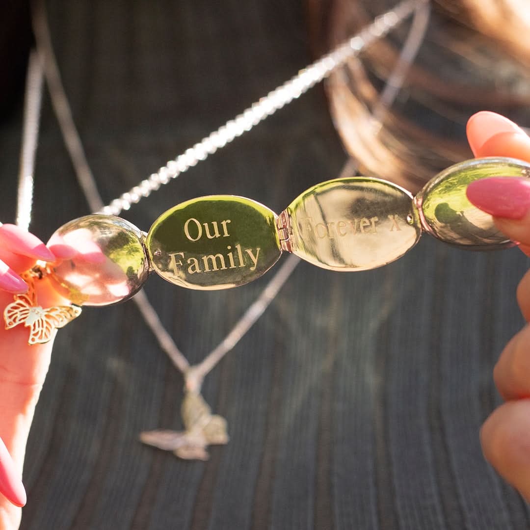 Four Photo Oval Butterfly Locket Silver & Gold + Photos