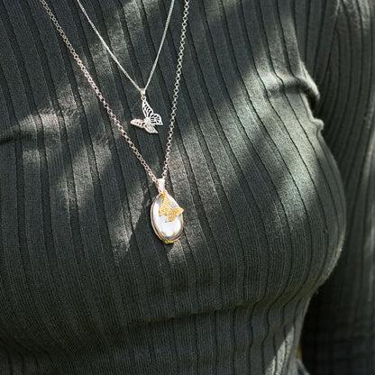 Four Photo Oval Butterfly Locket Silver & Gold + Photos