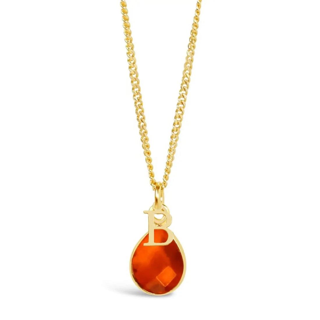 Carnelian teardrop gemstone in a gold setting on a gold curb chain. The necklace has a gold "B" initial ontop of the gemstone and is against a white background