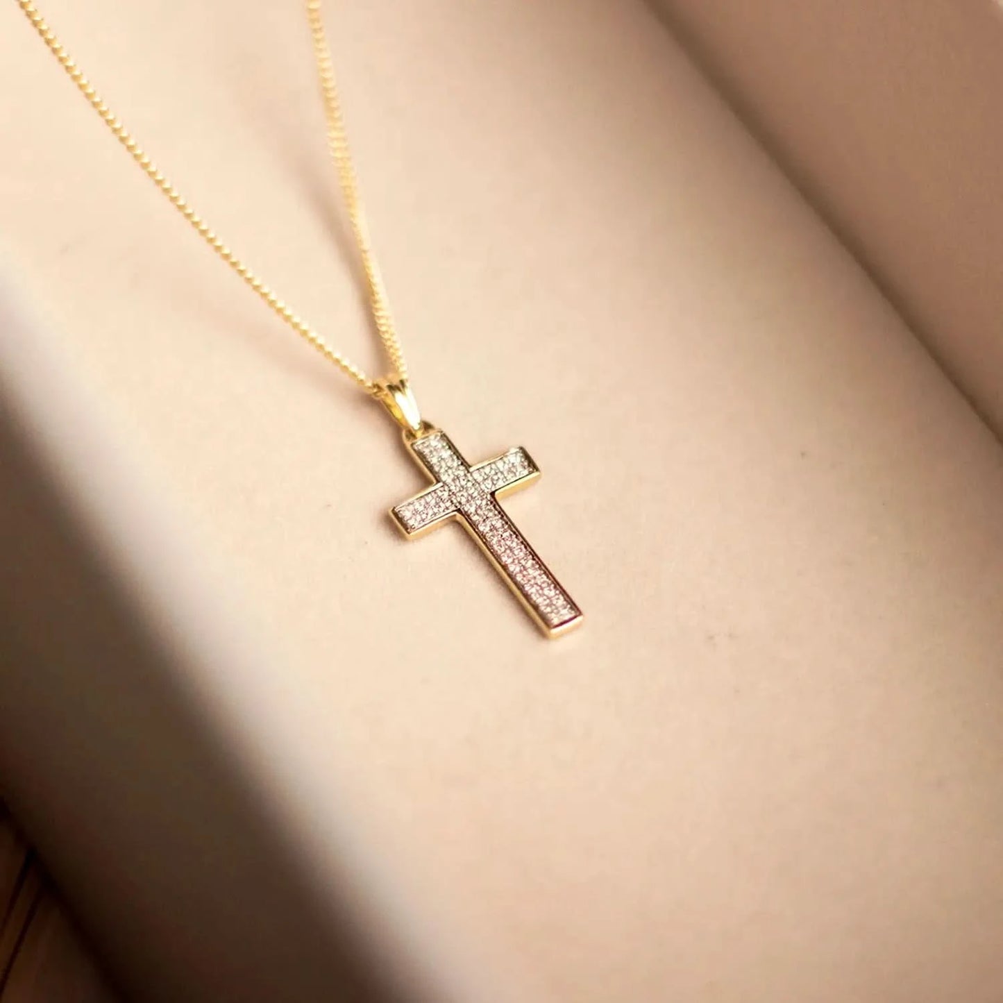 gold diamond cross necklace, sturdy gold curb chain, high polish finish, small shiny diamonds, religious Christian pendant for men and women