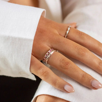 model wearing ruby and diamond solid white gold band ring