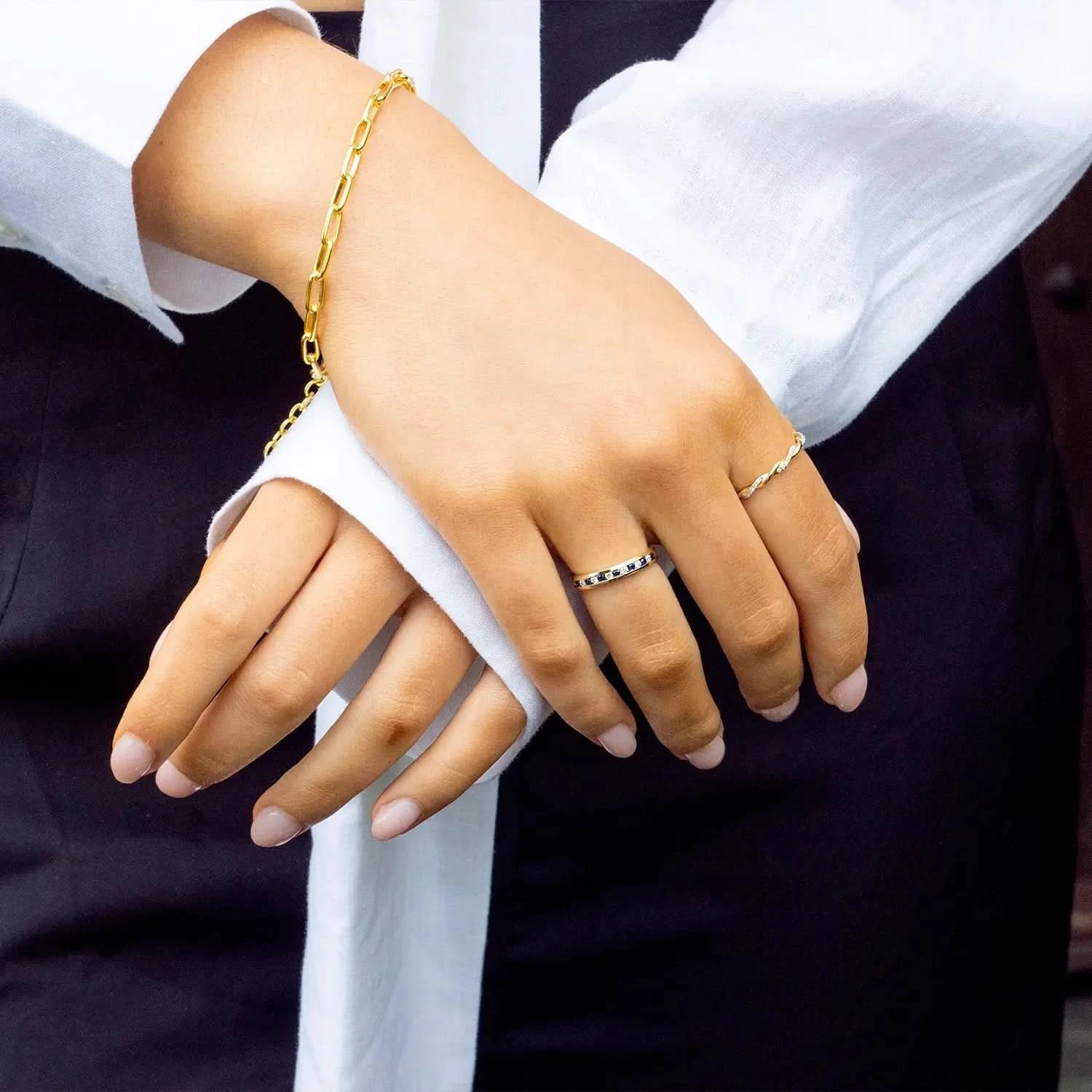model wearing sapphire and diamond solid white gold band ring 