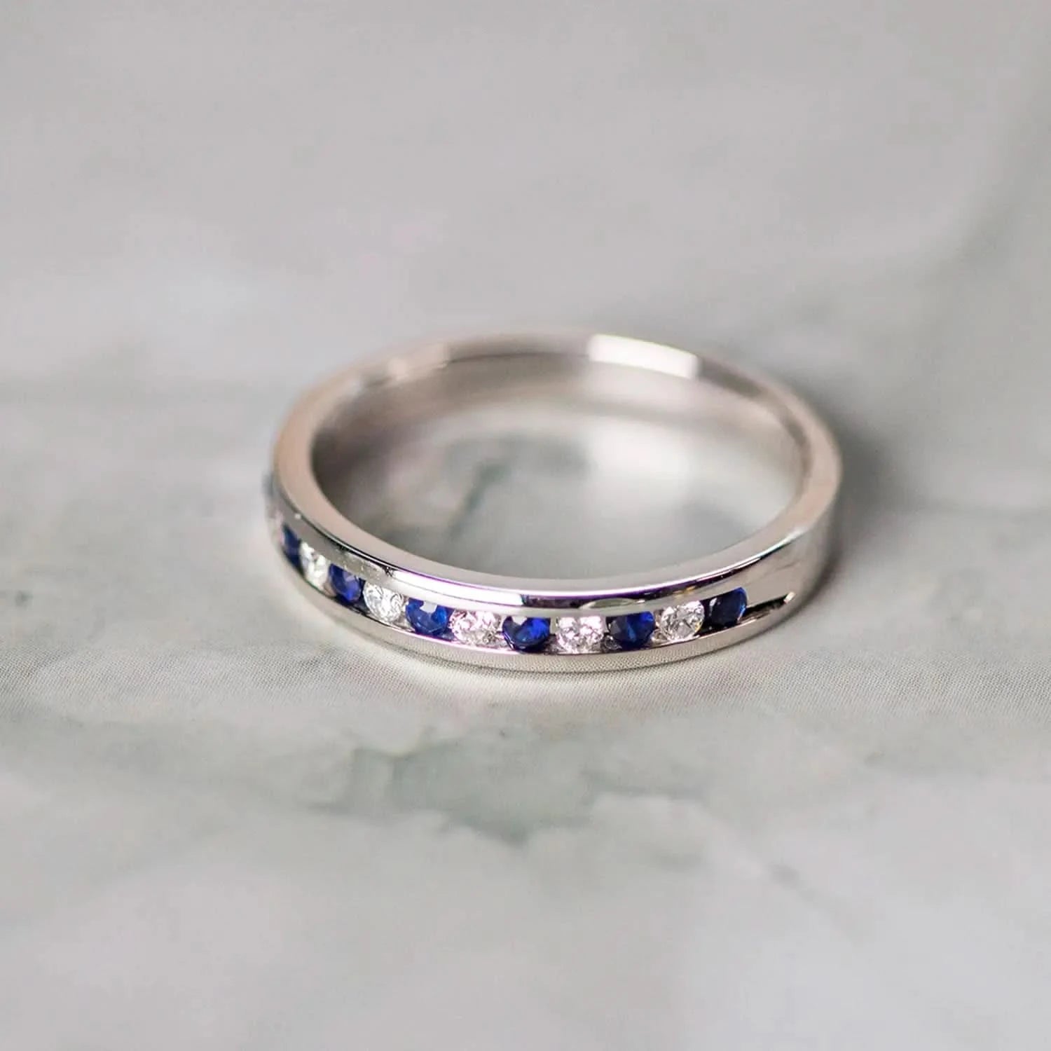 sapphire and diamond solid white gold band ring 
