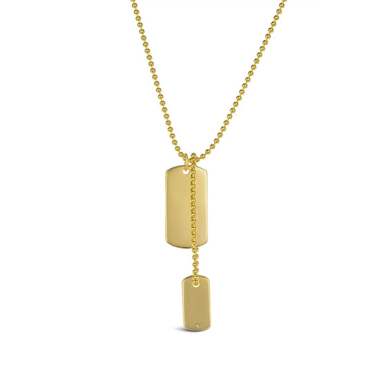 Gold dual dog tag necklace with two polished rectangular pendants on a popcorn chain.